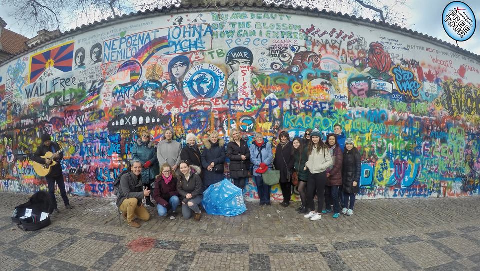 At the Lennon Wall with Extravaganza Free Tour.